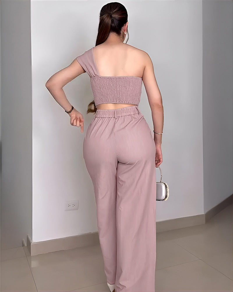VVZ One-shoulder sleeveless backless ruffled cropped top paired with high-waisted wide-leg pants