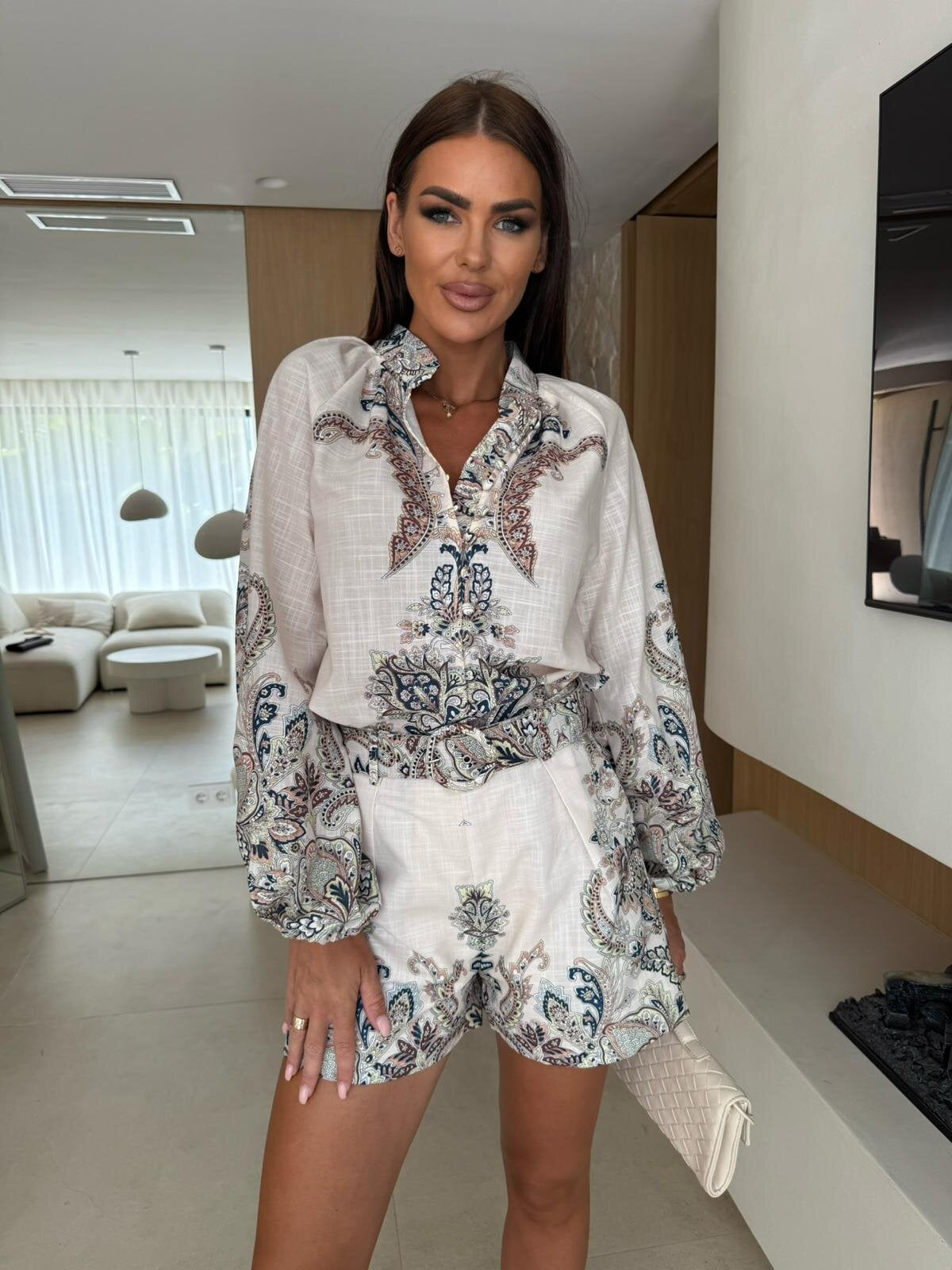 VVZ Floral pattern stand-up collar button-down lantern sleeve top paired with casual elastic waist shorts