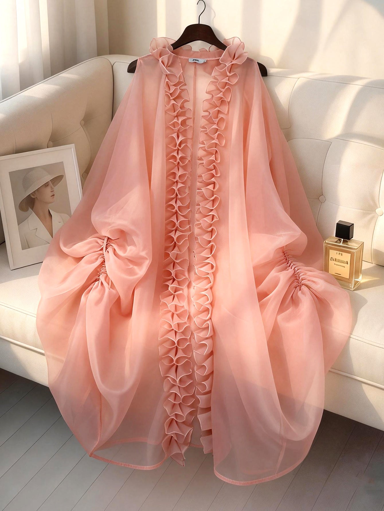 VVZ Ruffled sleeveless loose top paired with high-waisted wide-leg pleated trousers