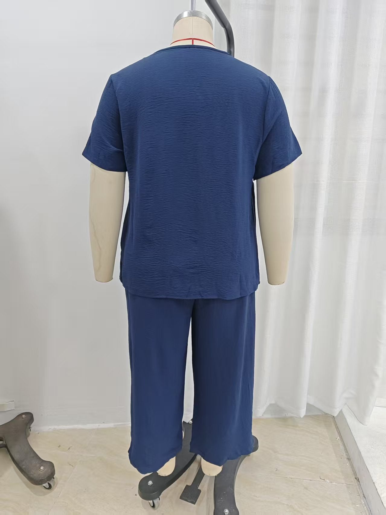 VVZ Elegant Plus-Size Women's Set: Solid-Color Short-Sleeve Fashion Top & Casual Wide-Leg Pants